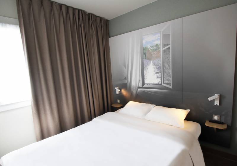 La chambre pour 2 personnes de l'hôtel B&B Valence TGV Romans à Alixan